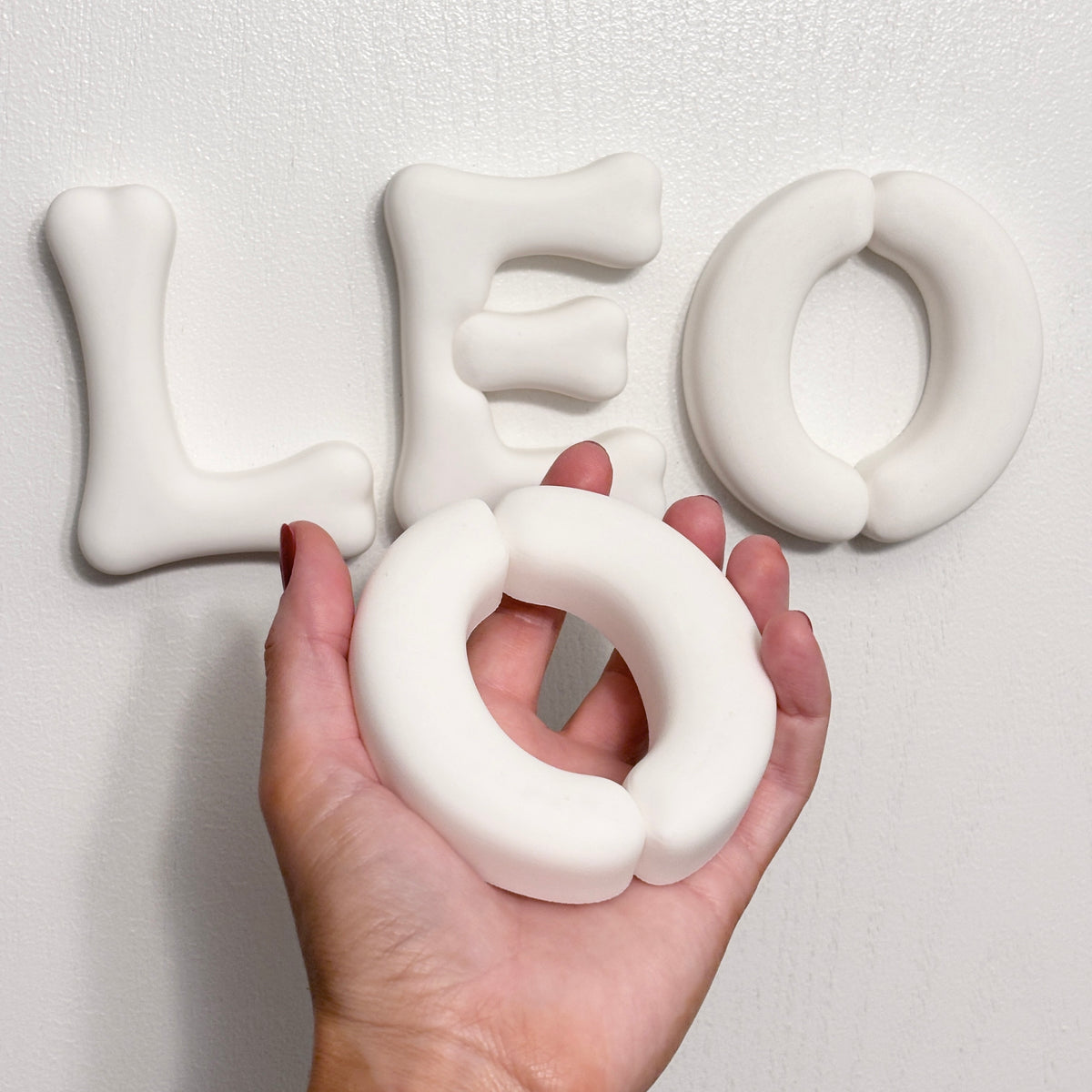 Personalized dinosaur name sign with 3D letters and coordinating dinosaur accent for a kids room