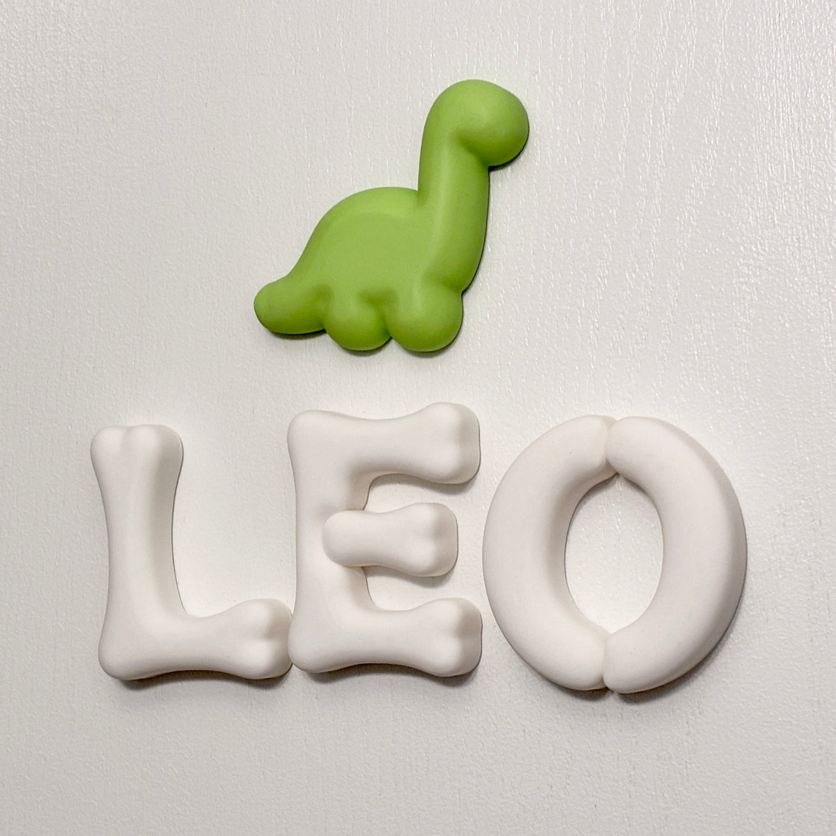 Personalized 3D dinosaur name sign with rounded fossil-inspired letters for kids room decor
by The Homenko Studio, Calgary, Canada