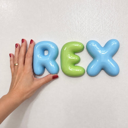 Blue and green personalized 3D bubble name letters with a glossy ceramic-look finish