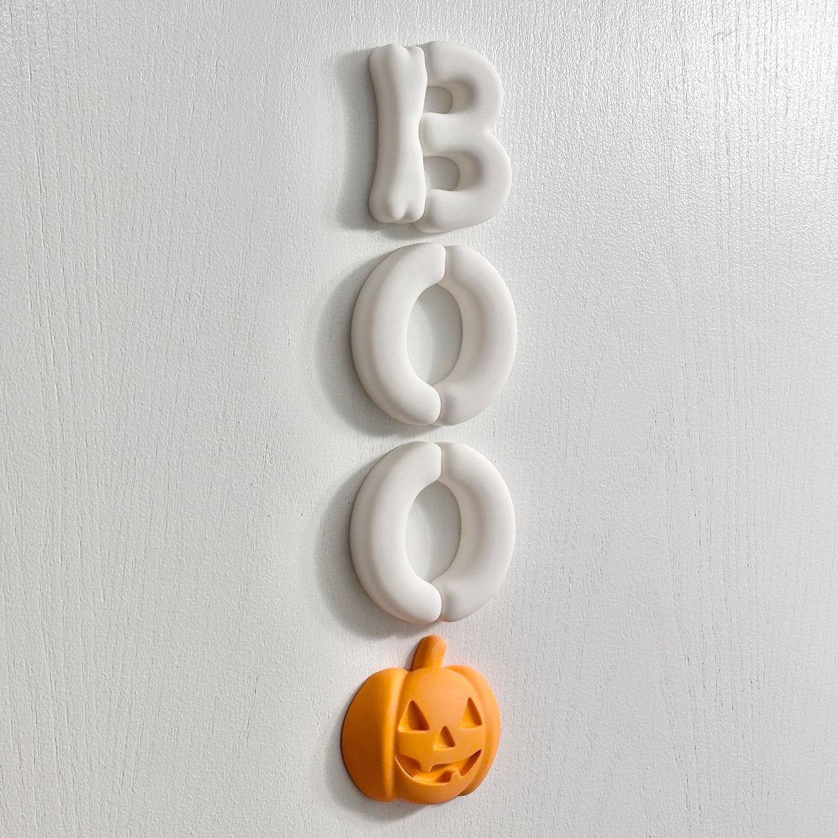 3D BOO Halloween sign with rounded letters and pumpkin accent for wall decor
by The Homenko Studio, Calgary, Canada