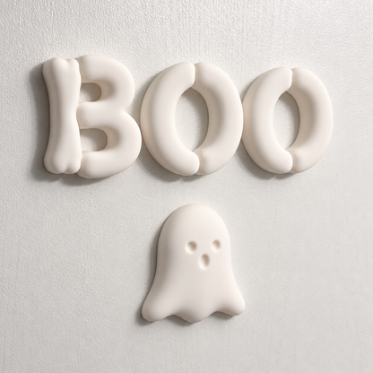 3D BOO sign arranged with a ghost accent for playful Halloween wall decor